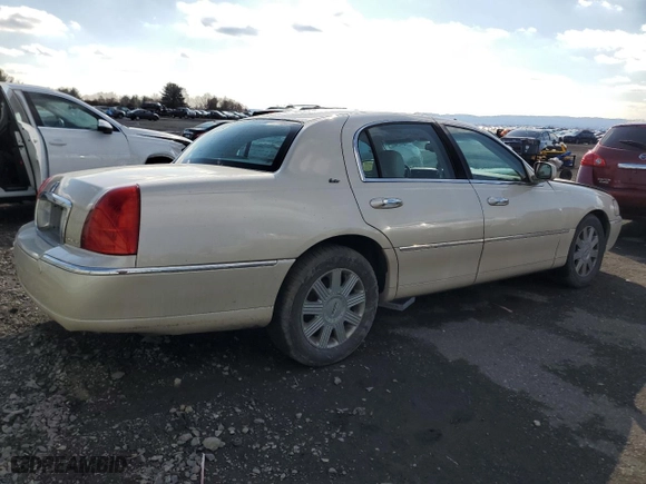 2003 Lincoln Town Car Cartier with VIN 1LNHM83WX3Y704827, listed as a Copart auction lot 44561495 with 89,936 mi miles and Salvage Title. Bid and sale history available at carsss.com. Image 3.