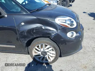 2014 FIAT 500L Lounge with VIN ZFBCFACH1EZ029757, listed as a IAAI auction lot 41643494 with 49,910 mi miles and . Bid and sale history available at DreamBid. Image 6.