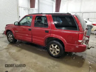 1999 Oldsmobile Bravada z VIN 1GHDT13W4X2705200, wystawiony jako Copart lot #43416245 z przebiegiem 173 522 mil mil oraz Szkoda całkowita • Salvage title. Historia ofert i sprzedaży dostępna na DreamBid. Obrazek 2.