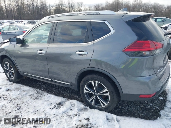 2017 Nissan Rogue SL with VIN JN8AT2MV7HW271485, listed as a IAAI auction lot 41100772 with 106,965 mi miles. Bid and sale history available at carsss.com. Image 3.