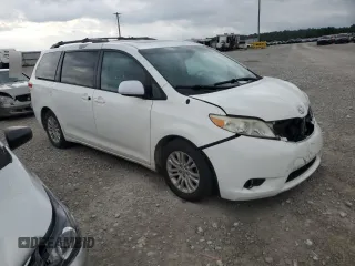 2012 Toyota Sienna XLE AAS with VIN 5TDYK3DC0CS212613, listed as a Copart auction lot 62317765 with 258,124 mi miles and Salvage title. Bid and sale history available at DreamBid. Image 4.