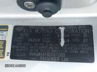 2013 Kia Optima LX z VIN KNAGM4A74D5371383, wystawiony jako IAAI lot #41756449 z przebiegiem 133 002 mil mil oraz . Historia ofert i sprzedaży dostępna na DreamBid. Obrazek 9.