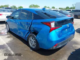 2020 Toyota Prius L Eco with VIN JTDKARFUXL3118354, listed as a IAAI auction lot 41991337 with 83,030 mi miles and . Bid and sale history available at DreamBid. Image 3.