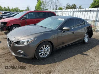 2014 Mazda 3 i Touring with VIN JM1BM1V79E1151770, listed as a Copart auction lot 60100155 with 274,752 mi miles and Salvage title. Bid and sale history available at DreamBid. Image 1.