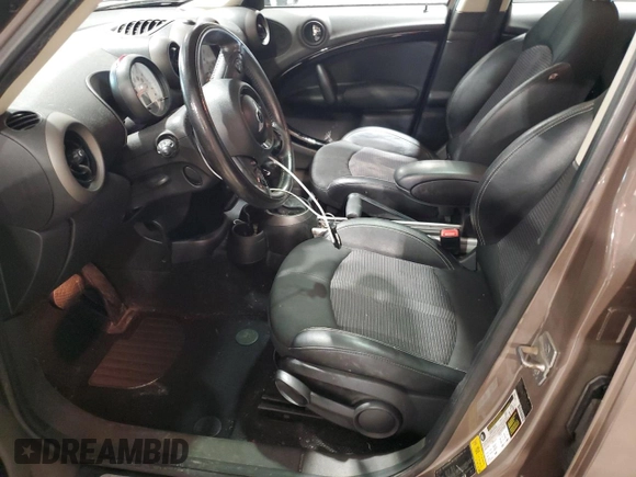 2012 MINI Countryman with VIN WMWZB3C52CWM01672, listed as a Copart auction lot 56064265 with 97,267 mi miles and Salvage Title. Bid and sale history available at DreamBid. Image 7.