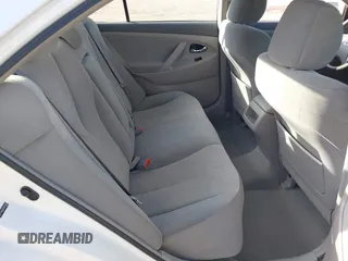 2009 Toyota Camry LE z VIN 4T1BK46K79U579024, wystawiony jako IAAI lot #41004813 z przebiegiem 154 621 mil mil oraz . Historia ofert i sprzedaży dostępna na DreamBid. Obrazek 8.