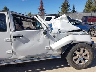 2013 Jeep Wrangler Unlimited Moab with VIN 1C4HJWEG7DL569862, listed as a IAAI auction lot 42095535 with Not provided miles and . Bid and sale history available at DreamBid. Image 15.