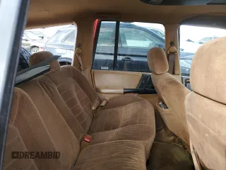 1996 Jeep Grand Cherokee Laredo with VIN 1J4GZ58Y0TC162591, listed as a Copart auction lot 43027025 with 383,318 mi miles and Salvage Title. Bid and sale history available at carsss.com. Image 10.