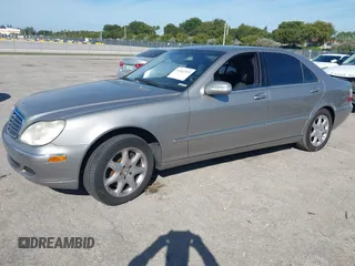 2004 Mercedes-Benz S-Class 4.3L with VIN WDBNG83J14A406775, listed as a IAAI auction lot 41442333 with 77,463 mi miles. Bid and sale history available at carsss.com. Image 2.