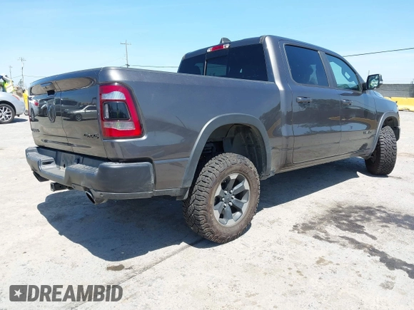 2020 Ram 1500 Rebel with VIN 1C6SRFLT8LN164196, listed as a IAAI auction lot 42538059 with 60,520 mi miles and . Bid and sale history available at DreamBid. Image 4.