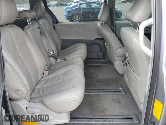 2011 Toyota Sienna LE AAS z VIN 5TDKK3DC4BS041885, wystawiony jako Copart lot #54929275 z przebiegiem 214 342 mil mil oraz Szkoda całkowita • Salvage title. Historia ofert i sprzedaży dostępna na DreamBid. Obrazek 11.