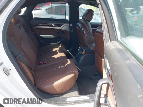 2011 Audi A8 z VIN WAUAVAFD7BN021601, wystawiony jako IAAI lot #42233726 z przebiegiem 182 583 mil mil oraz . Historia ofert i sprzedaży dostępna na DreamBid. Obrazek 8.