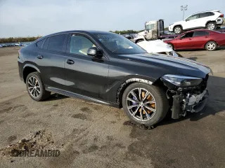 2021 BMW X6 xDrive40i z VIN 5UXCY6C07M9D92823, wystawiony jako Copart lot #68319162 z przebiegiem 21 755 mil mil oraz . Historia ofert i sprzedaży dostępna na DreamBid. Obrazek 4.