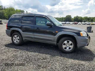 2002 Mazda Tribute LX with VIN 4F2CU09182KM28600, listed as a Copart auction lot 62314004 with 108,048 mi miles and Salvage Title. Bid and sale history available at carsss.com. Image 4.