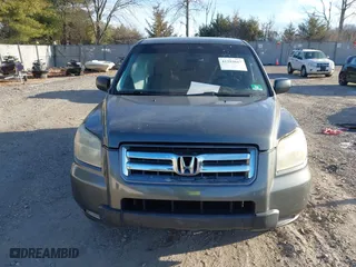 2007 Honda Pilot LX with VIN 2HKYF18197H504905, listed as a IAAI auction lot 41293667 with 200,448 mi miles. Bid and sale history available at carsss.com. Image 12.