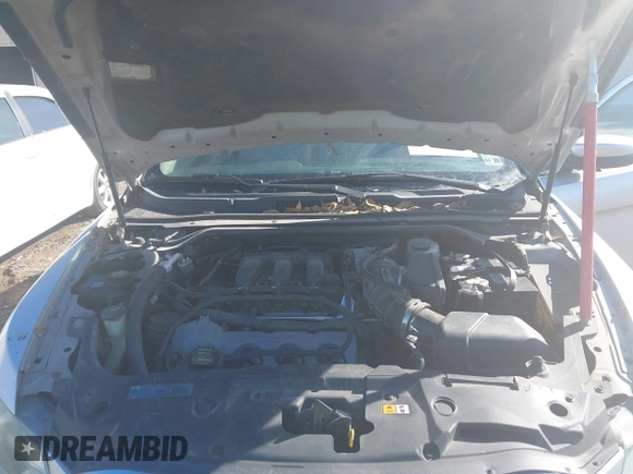 2012 Ford Taurus SEL with VIN 1FAHP2EW0CG144849, listed as a IAAI auction lot 41332919 with 257,793 mi miles and . Bid and sale history available at DreamBid. Image 10.