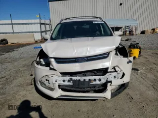 2013 Ford Escape Titanium с VIN 1FMCU0J96DUD67980, выставлен на аукционе Copart как лот 87187974 с пробегом 107 284 миль миль и Списание • Salvage title. История ставок и продаж доступна на DreamBid. Изображение 5.