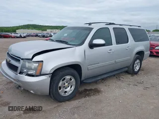 2011 Chevrolet Suburban LT with VIN 1GNSCJE05BR294452, listed as a IAAI auction lot 42107580 with 165,313 mi miles and . Bid and sale history available at DreamBid. Image 2.