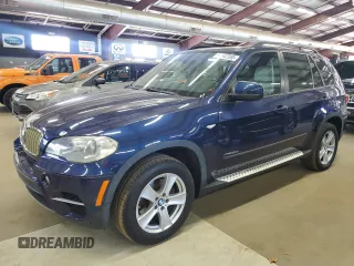 2012 BMW X5 35d with VIN 5UXZW0C53CL672780, listed as a Copart auction lot 61647355 with 84,865 mi miles and Clean title. Bid and sale history available at DreamBid. Image 1.