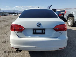2014 Volkswagen Jetta SE with VIN 3VWD17AJ0EM423581, listed as a Copart auction lot 57253094 with 126,610 mi miles and Salvage title. Bid and sale history available at DreamBid. Image 6.