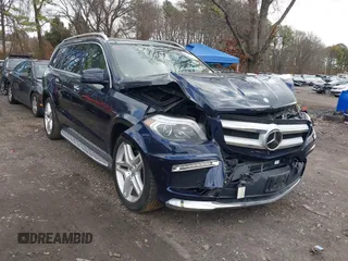 2014 Mercedes-Benz GL-Class GL 550 with VIN 4JGDF7DE2EA313661, listed as a IAAI auction lot 41214931 with 102,469 mi miles. Bid and sale history available at carsss.com. Image 1.