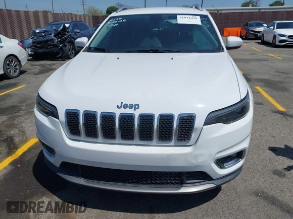 2019 Jeep Cherokee Limited z VIN 1C4PJLDB0KD396077, wystawiony jako IAAI lot #41972498 z przebiegiem 128 312 mil mil oraz . Historia ofert i sprzedaży dostępna na DreamBid. Obrazek 12.