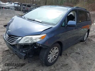 2014 Toyota Sienna XLE with VIN 5TDYK3DC9ES511035, listed as a IAAI auction lot 41884115 with 153,071 mi miles. Bid and sale history available at carsss.com. Image 18.