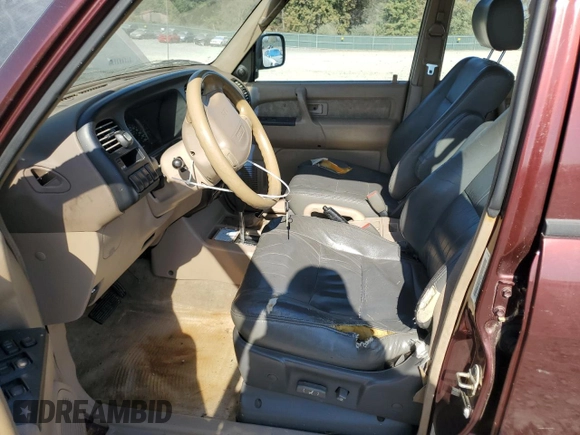 2000 Isuzu Trooper S with VIN JACDJ58X2Y7J11793, listed as a Copart auction lot 77431754 with 214,854 mi miles and Clean title. Bid and sale history available at DreamBid. Image 7.