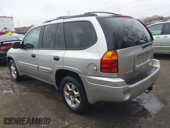 2004 GMC Envoy SLT with VIN 1GKDT13S242398113, listed as a IAAI auction lot 41722942 with 175,173 mi miles and . Bid and sale history available at DreamBid. Image 3.