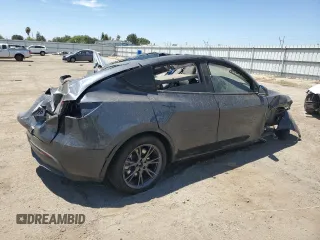 2024 Tesla Model Y z VIN 7SAYGDED6RF204899, wystawiony jako Copart lot #65517855 z przebiegiem Nie podano mil oraz Czysty tytuł • Clean title. Historia ofert i sprzedaży dostępna na DreamBid. Obrazek 3.