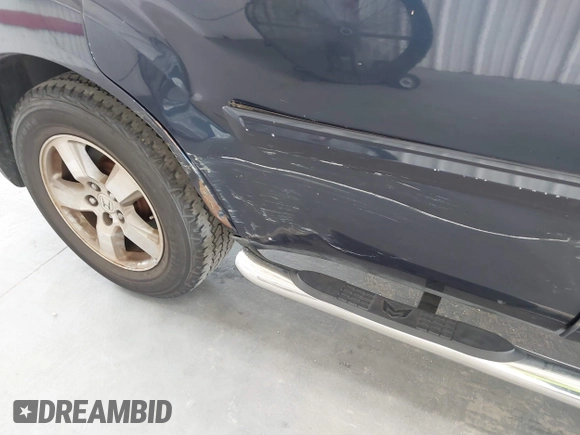 2009 Honda Pilot EX-L with VIN 5FNYF38509B012425, listed as a IAAI auction lot 42588334 with 253,011 mi miles and . Bid and sale history available at DreamBid. Image 6.
