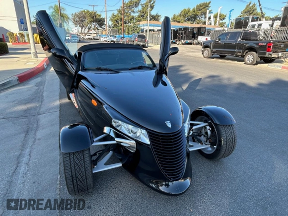 2000 Plymouth Prowler z VIN 1P3EW65G6YV602347, wystawiony jako Copart lot #71067714 z przebiegiem 65 554 mil mil oraz Tytuł czysty. Historia ofert i sprzedaży dostępna na DreamBid. Obrazek 8.