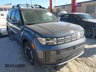 2025 Hyundai Santa Fe SEL z VIN 5NMP24GL6SH121425, wystawiony jako IAAI lot #41839527 z przebiegiem 796 mil mil oraz . Historia ofert i sprzedaży dostępna na DreamBid. Obrazek 1.