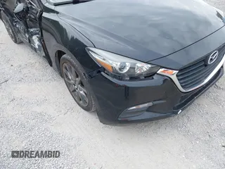 2018 Mazda 3 Touring z VIN 3MZBN1V36JM202498, wystawiony jako IAAI lot #42380709 z przebiegiem 108 930 mil mil oraz . Historia ofert i sprzedaży dostępna na DreamBid. Obrazek 6.