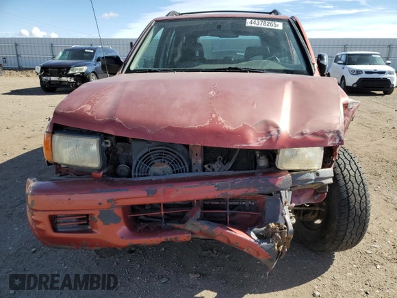 1999 Isuzu Rodeo S with VIN 4S2CM58WXX4318576, listed as a Copart auction lot 44378265 with 258,981 mi miles and Salvage Title. Bid and sale history available at DreamBid. Image 5.