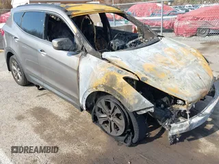 2014 Hyundai Santa Fe z VIN 5XYZUDLB6EG181087, wystawiony jako IAAI lot #40730120 z przebiegiem Nie podano mil oraz . Historia ofert i sprzedaży dostępna na DreamBid. Obrazek 1.