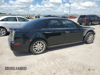 2008 Cadillac STS RWD z VIN 1G6DK67V980143995, wystawiony jako Copart lot #56365325 z przebiegiem 128 787 mil mil oraz Szkody całkowita. Historia ofert i sprzedaży dostępna na DreamBid. Obrazek 3.