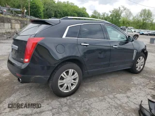 2015 Cadillac SRX Luxury Collection z VIN 3GYFNEE33FS574163, wystawiony jako Copart lot #56667985 z przebiegiem 103 697 mil mil oraz Szkody całkowita. Historia ofert i sprzedaży dostępna na DreamBid. Obrazek 3.