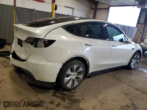 2022 Tesla Model Y Long Range z VIN 7SAYGDEEXNA012904, wystawiony jako Copart lot #57492865 z przebiegiem 31 294 mil mil oraz Szkody całkowita. Historia ofert i sprzedaży dostępna na DreamBid. Obrazek 3.