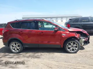 2015 Ford Escape Titanium with VIN 1FMCU0J92FUA38616, listed as a IAAI auction lot 42136816 with 131,941 mi miles and . Bid and sale history available at DreamBid. Image 13.