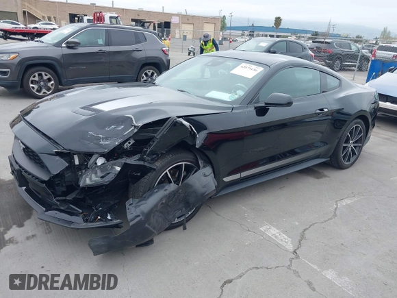 2022 Ford Mustang EcoBoost with VIN 1FA6P8THXN5145312, listed as a IAAI auction lot 42075186 with 28,233 mi miles and . Bid and sale history available at DreamBid. Image 2.