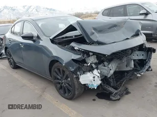 2024 Mazda 3 S Carbon Edition with VIN 3MZBPBCM9RM415159, listed as a IAAI auction lot 41309145 with 4,492 mi miles and . Bid and sale history available at DreamBid. Image 1.