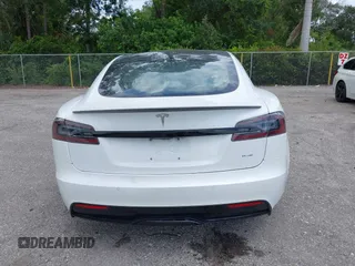 2022 Tesla Model S Plaid with VIN 5YJSA1E61NF460155, listed as a IAAI auction lot 42545167 with 51,711 mi miles and . Bid and sale history available at DreamBid. Image 16.