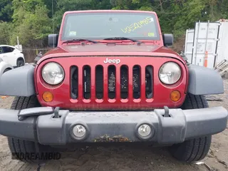 2013 Jeep Wrangler Unlimited Sport with VIN 1C4HJWDG7DL516077, listed as a IAAI auction lot 42521985 with 169,299 mi miles and . Bid and sale history available at DreamBid. Image 6.