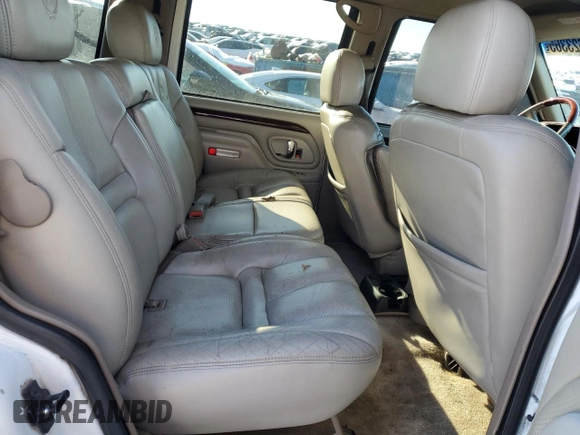 1999 Cadillac Escalade z VIN 1GYEK13R3XR406970, wystawiony jako Copart lot #87623365 z przebiegiem 189 339 mil mil oraz Szkoda całkowita • Salvage title. Historia ofert i sprzedaży dostępna na DreamBid. Obrazek 11.