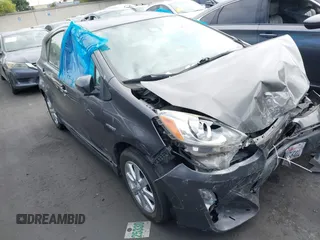 2017 Toyota Prius One z VIN JTDKDTB39H1592526, wystawiony jako IAAI lot #42474365 z przebiegiem 124 777 mil mil oraz . Historia ofert i sprzedaży dostępna na DreamBid. Obrazek 1.