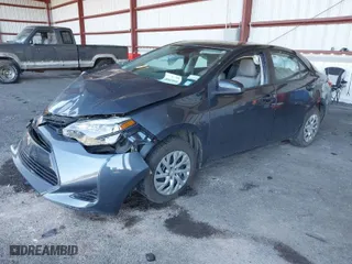 2019 Toyota Corolla L with VIN 2T1BURHE6KC216249, listed as a IAAI auction lot 40669990 with 69,077 mi miles. Bid and sale history available at carsss.com. Image 2.