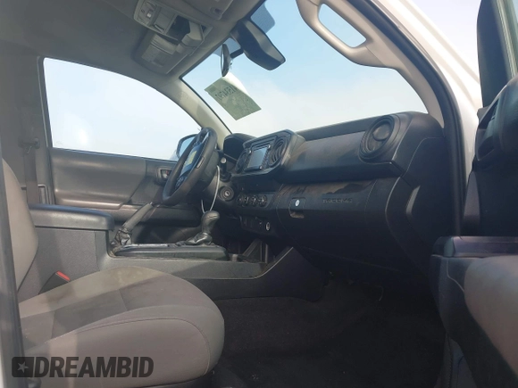 2019 Toyota Tacoma SR with VIN 5TFSX5EN0KX066774, listed as a IAAI auction lot 41534797 with 153,172 mi miles and . Bid and sale history available at DreamBid. Image 5.