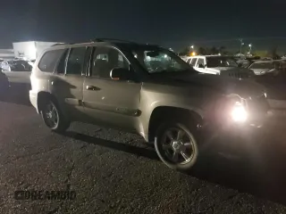 2002 GMC Envoy SLT with VIN 1GKDT13S522286497, listed as a Copart auction lot 84501384 with 207,226 mi miles and Salvage Title. Bid and sale history available at carsss.com. Image 4.