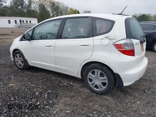 2010 Honda Fit with VIN JHMGE8H23AC009813, listed as a IAAI auction lot 41900735 with 220,000 mi miles. Bid and sale history available at carsss.com. Image 3.